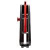 Module de pliage Wispeed T855 — vue de champ : le levier rouge sur toute la longueur et le bouton poussoir de sécurité Module de pliage Wispeed T855 — vue de champ : le levier rouge sur toute la longueur et le bouton poussoir de sécurité