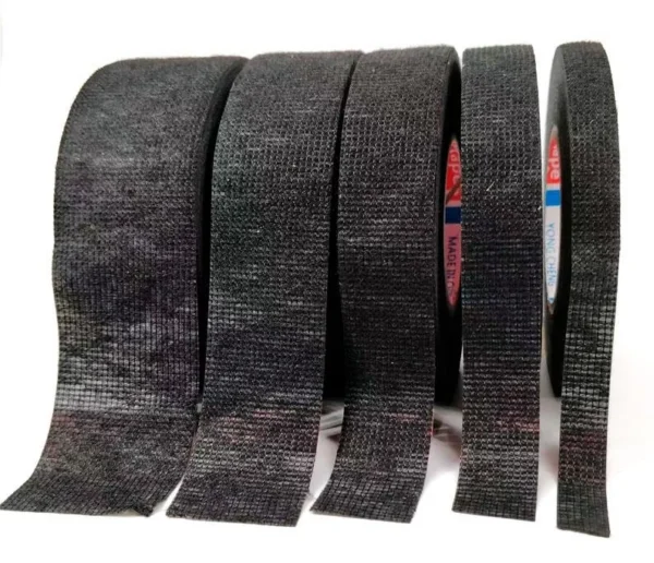 Rouleaux de ruban tissu empilés Rouleaux de ruban tissu empilés