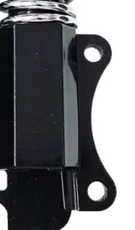 Détail du support d’étrier de frein à deux œillets, sur le côté du corps d’amortisseur Détail du support d’étrier de frein à deux œillets, sur le côté du corps d’amortisseur
