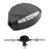 Compteur Kukirin G4 de trois quarts, bandeau de trois optiques LED en façade