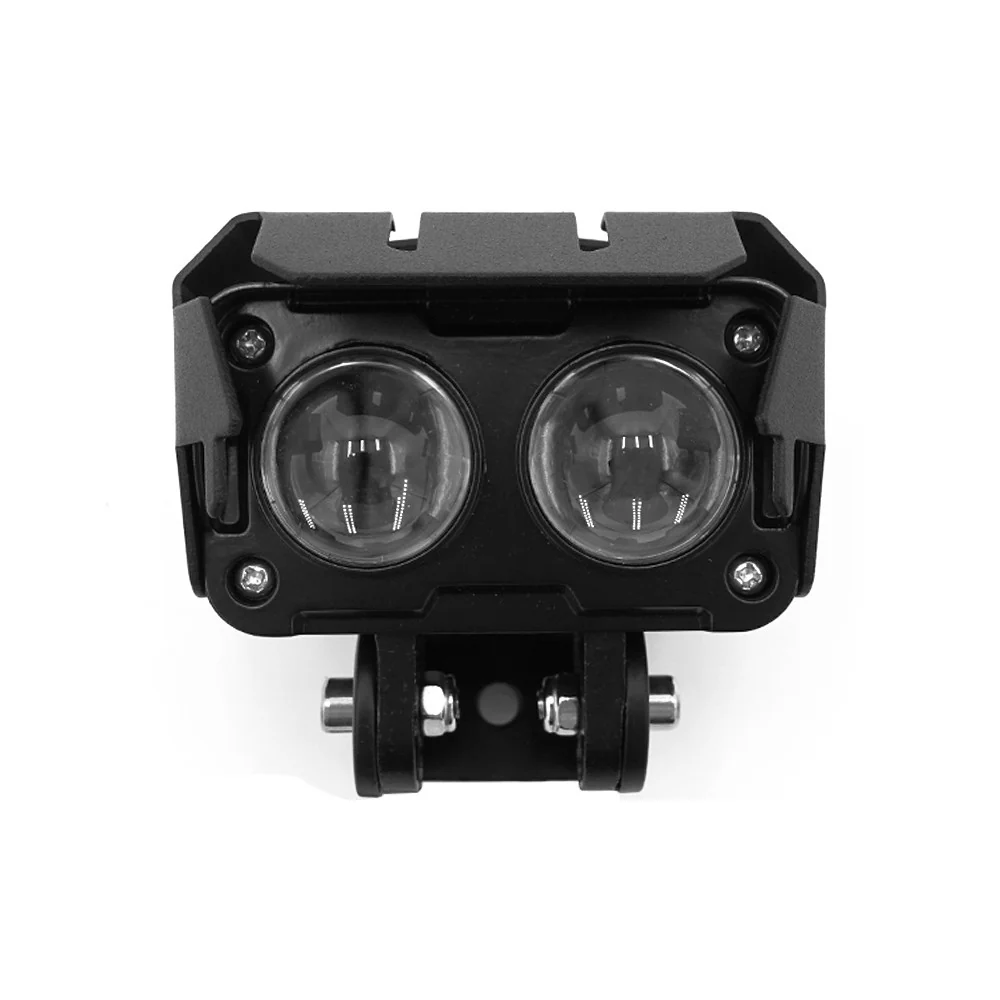 Éclairage trottinette électrique : phare double LED noir monté sur guidon, devise robuste et adaptateur métallique visible.