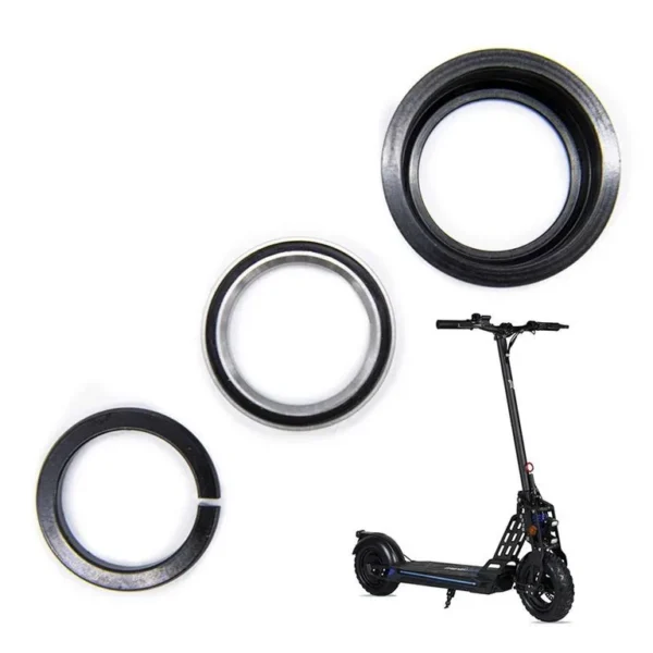 Les trois pièces du jeu de direction Ecoxtrem Bison séparées, bague au premier plan Les trois pièces du jeu de direction Ecoxtrem Bison séparées, bague au premier plan