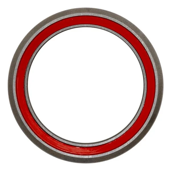 Roulement de direction vu de face, joint rouge entre les deux bagues métalliques Roulement de direction vu de face, joint rouge entre les deux bagues métalliques