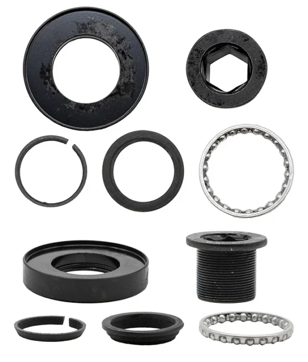 Les cinq pièces du kit de roulement Mi4 Lite Gen 2, vues de dessus et en perspective Les cinq pièces du kit de roulement Mi4 Lite Gen 2, vues de dessus et en perspective