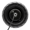 Moteur-roue Kukirin G4 vu de face, flanc du pneu tubeless 90/65-6.5 et carter du moyeu Moteur-roue Kukirin G4 vu de face, flanc du pneu tubeless 90/65-6.5 et carter du moyeu
