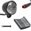 Phare avant Hikerboy Foxtrot Plus vu de face, LED centrale et catadioptre blanc Phare avant Hikerboy Foxtrot Plus vu de face, LED centrale et catadioptre blanc