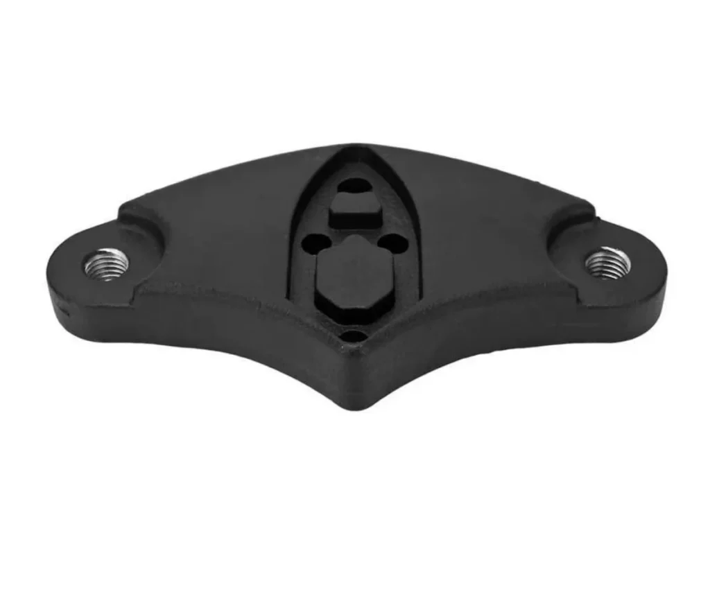 Plaque de fixation vue de dessus : les deux filetages M10 et l'empreinte hexagonale centrale