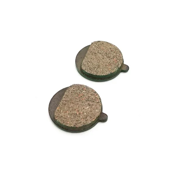 Paire de plaquettes de frein céramique 21 mm, garniture beige sur support vert Paire de plaquettes de frein céramique 21 mm, garniture beige sur support vert