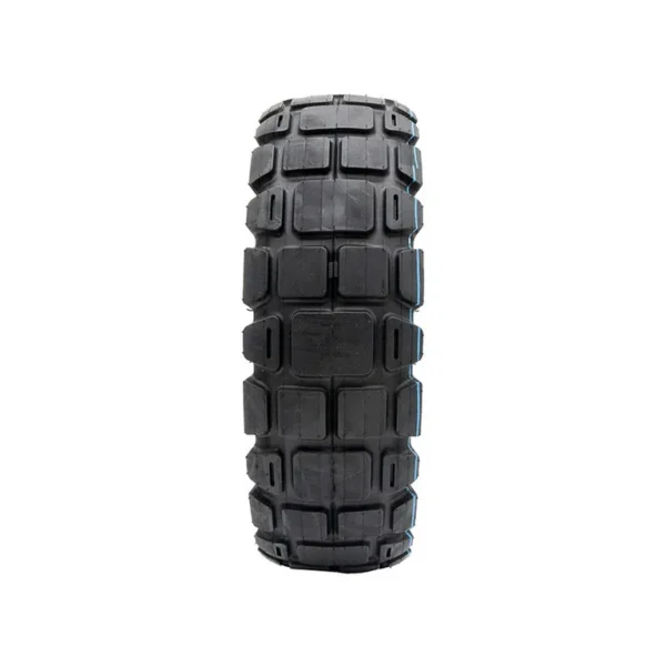 Bande de roulement du pneu 12 × 3 : pavés larges et épaulements marqués Bande de roulement du pneu 12 × 3 : pavés larges et épaulements marqués