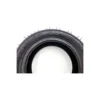 Flanc du pneu 90/65-6,5 gravé TUBELESS, pression 50 psi et charge maximale 55 kg