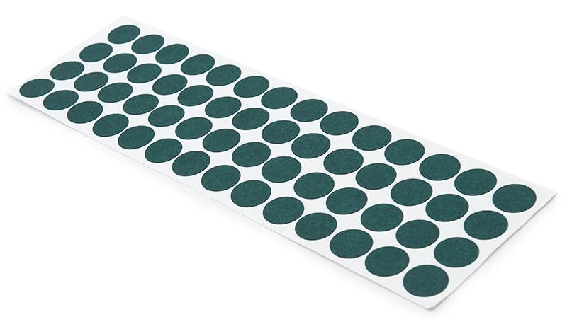 Détail d'une planche de rondelles isolantes négatives 18 mm