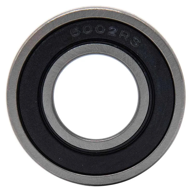 Roulement à billes vu de face, joint souple noir marqué 6002RS en creux et alésage central ouvert