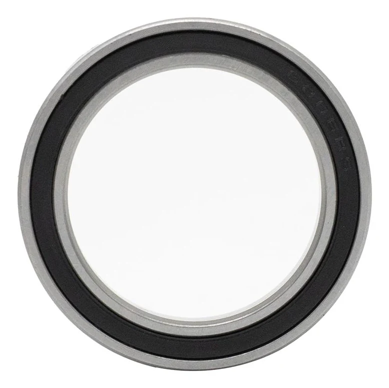 Roulement à billes vu de face : bague mince, joint souple noir avec un marquage en creux, large alésage central
