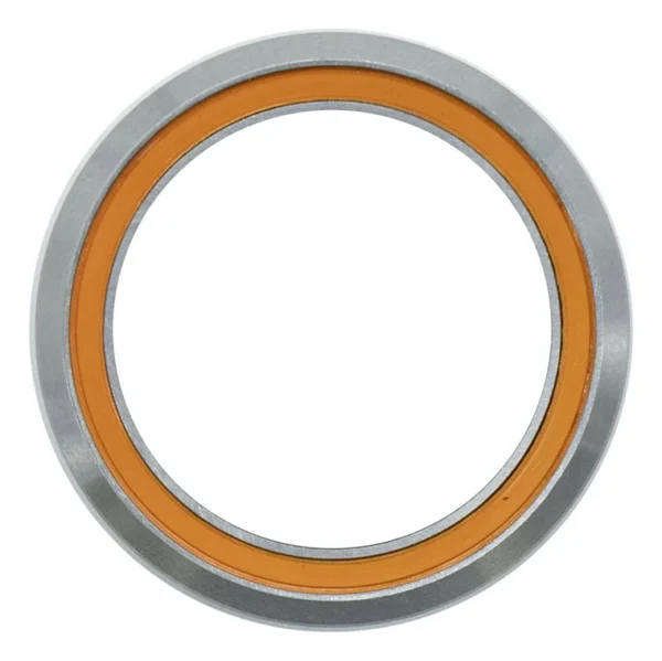 Roulement de direction vu de face, bague en acier et joint orange sur la couronne Roulement de direction vu de face, bague en acier et joint orange sur la couronne