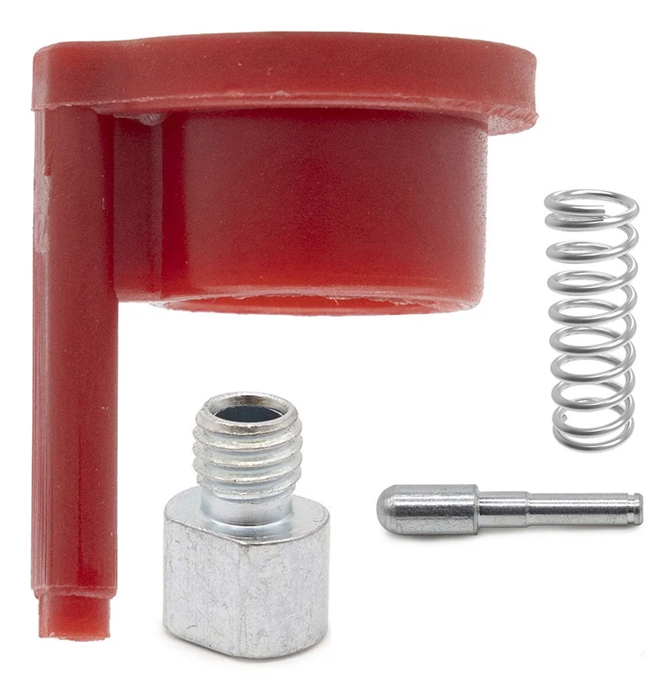 Les quatre pièces du kit : verrou rouge, ressort, entretoise filetée et goupille acier